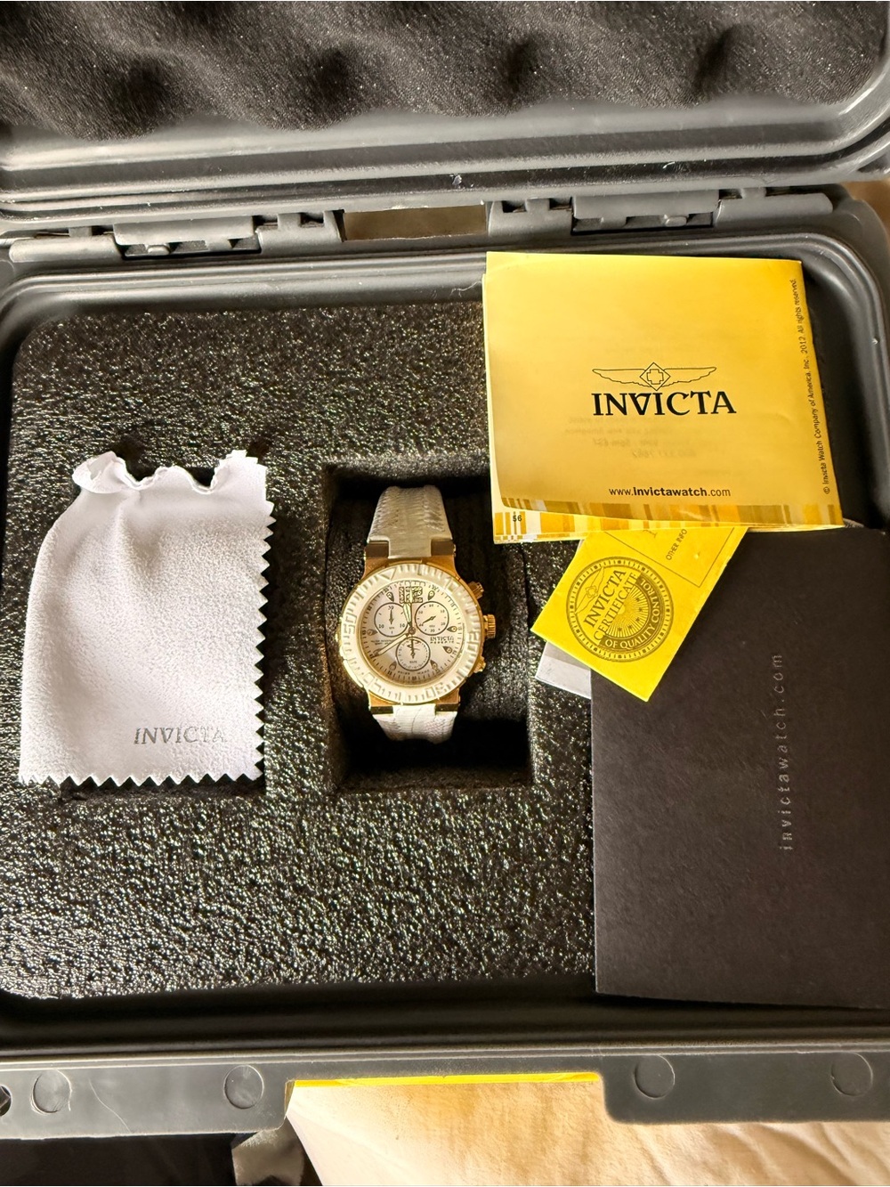 White and gold watch